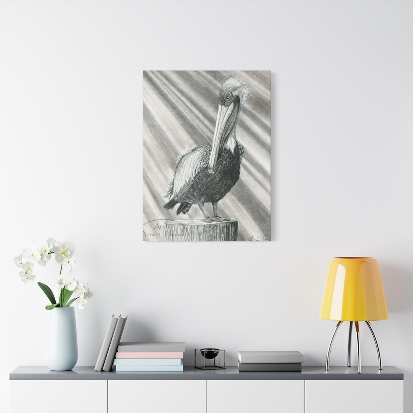 Black & White Pelican Sitting On A Wooden Block Poster Wall Art & Canvas Prints