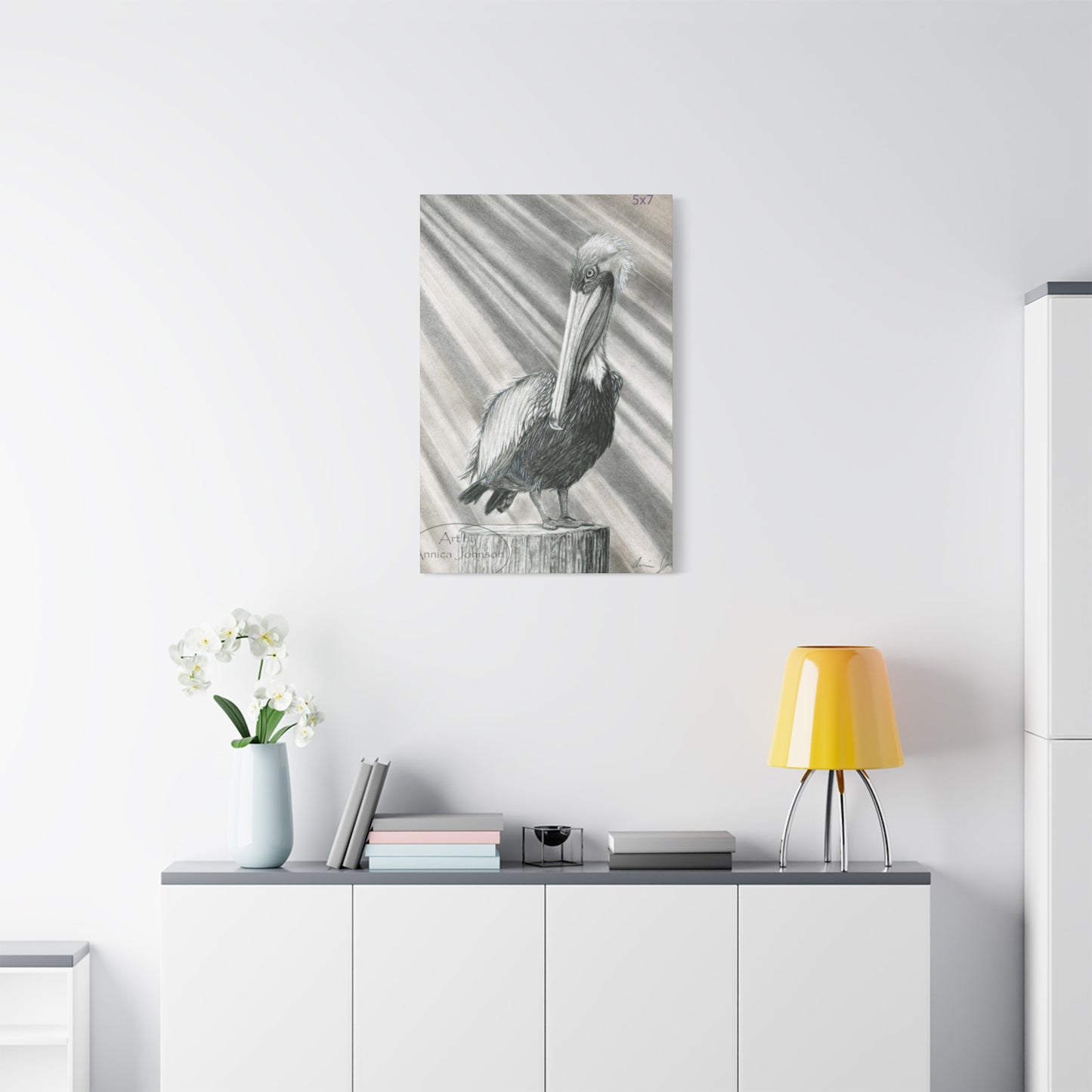 Black & White Pelican Sitting On A Wooden Block Poster Wall Art & Canvas Prints